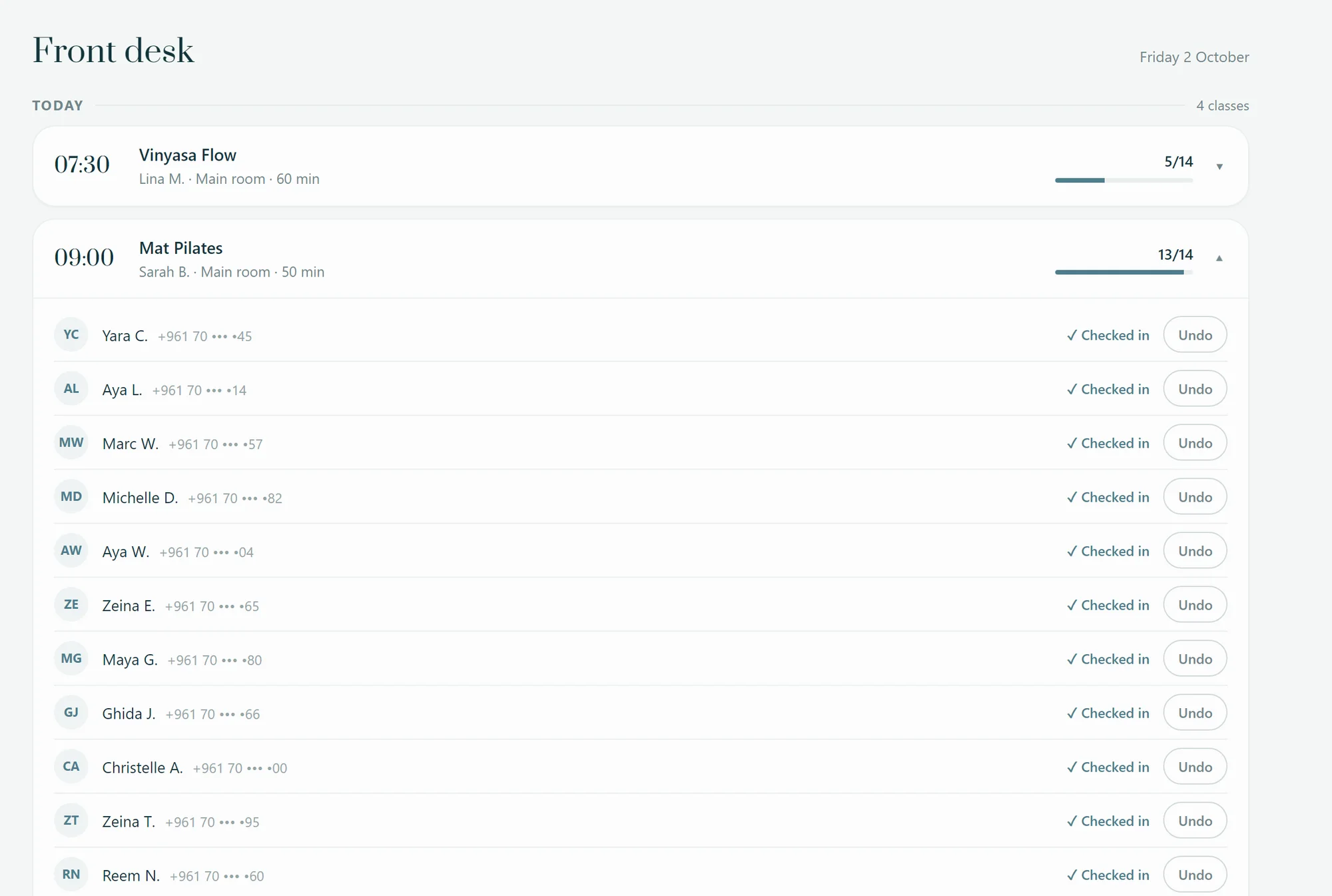 The front desk: a class roster with members checked in